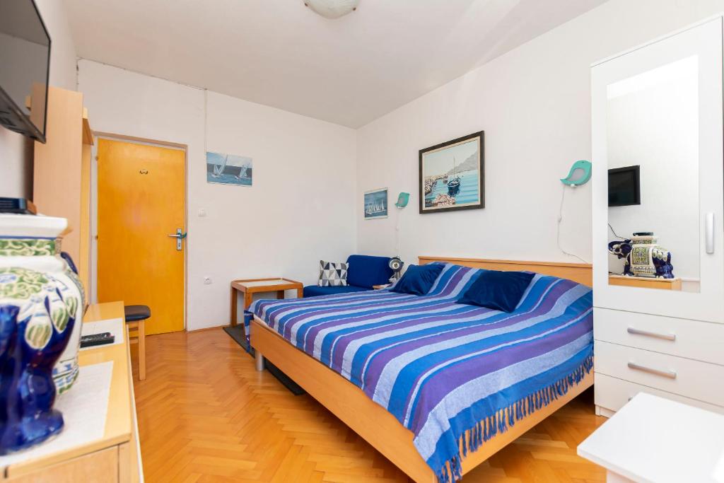 Posteľ alebo postele v izbe v ubytovaní Apartment Two Sisters