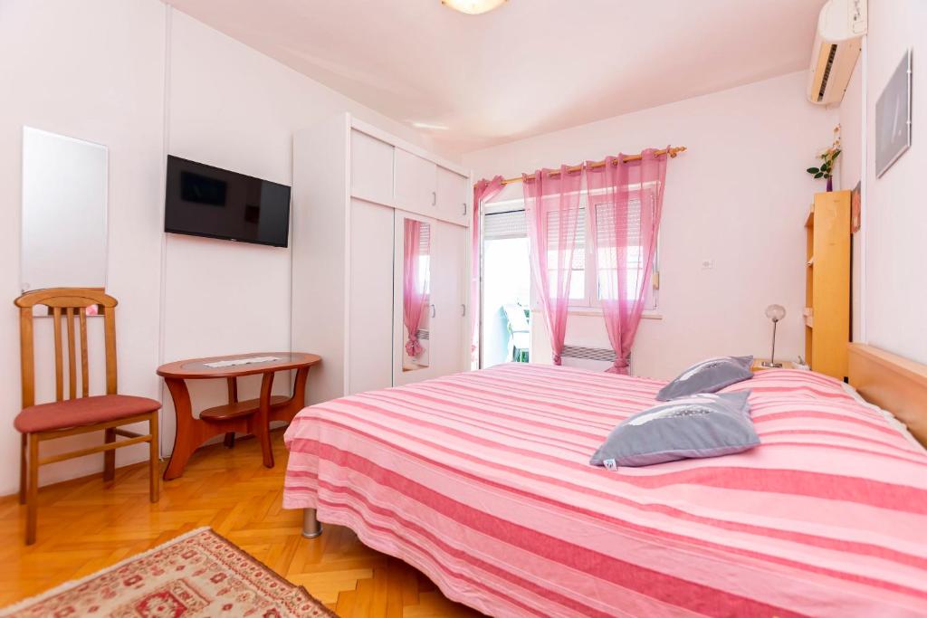 Posteľ alebo postele v izbe v ubytovaní Apartment Two Sisters