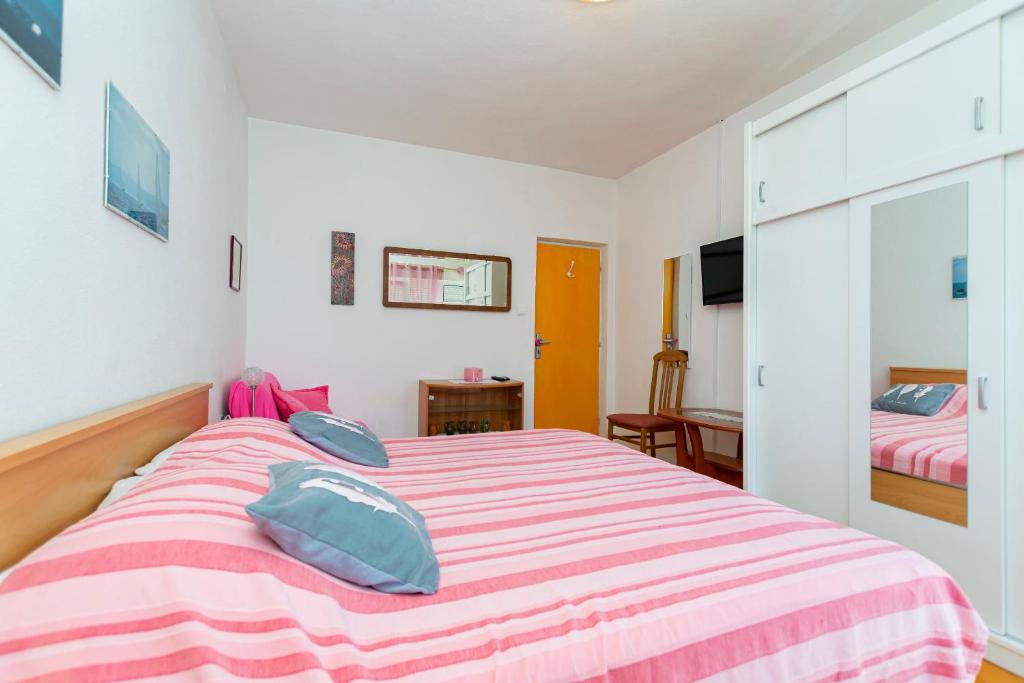 Posteľ alebo postele v izbe v ubytovaní Apartment Two Sisters