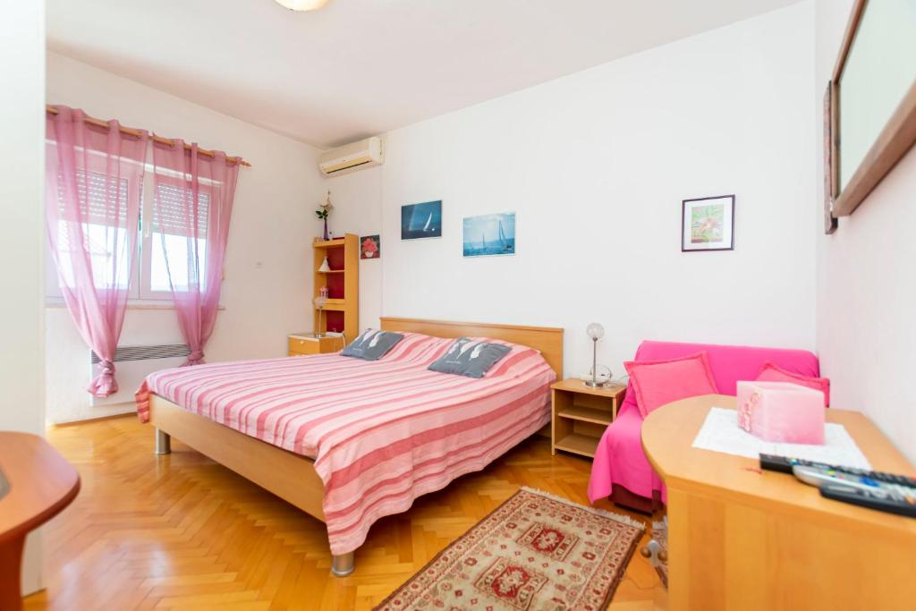 Posteľ alebo postele v izbe v ubytovaní Apartment Two Sisters