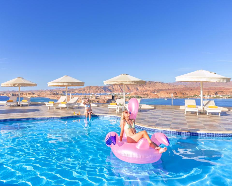 Bazén v ubytování Albatros Sharm Resort - By Pickalbatros nebo v jeho okolí