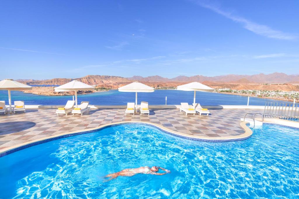 Bazén v ubytování Albatros Sharm Resort - By Pickalbatros nebo v jeho okolí