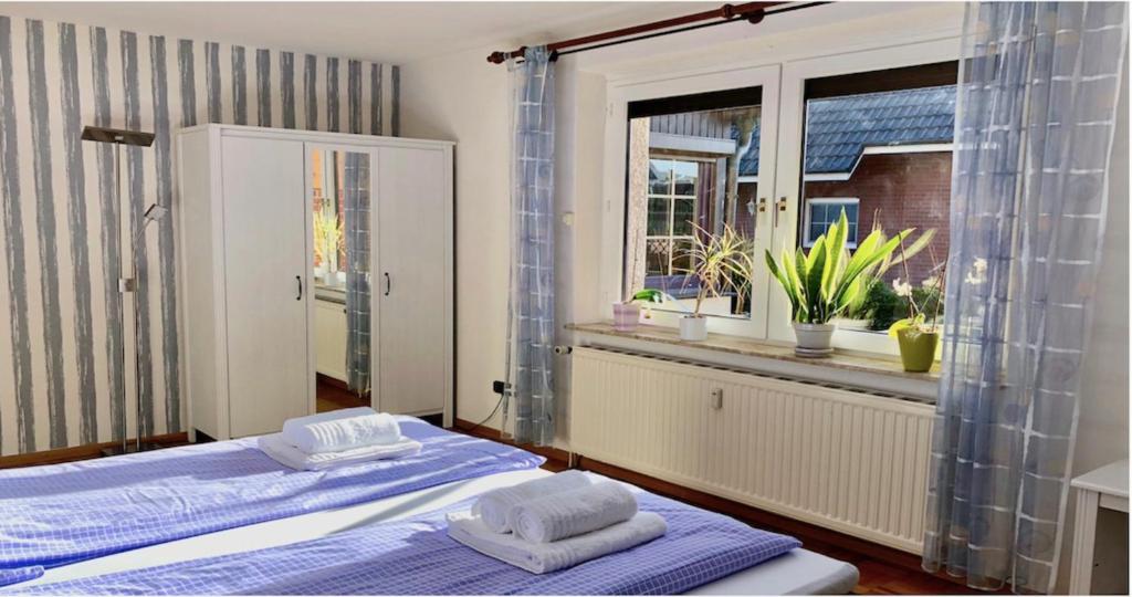 Postel nebo postele na pokoji v ubytování Yildirim Touristik Wohnung L&L 10