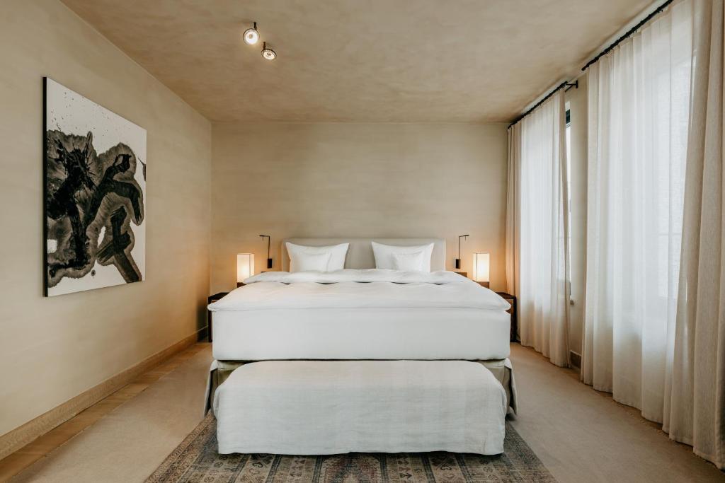 Postel nebo postele na pokoji v ubytování Hotel PURS