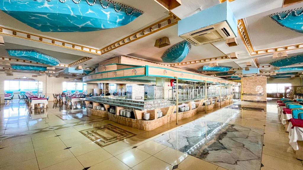 Restaurace v ubytování Daima Biz Hotel - Dolusu Aquapark Access