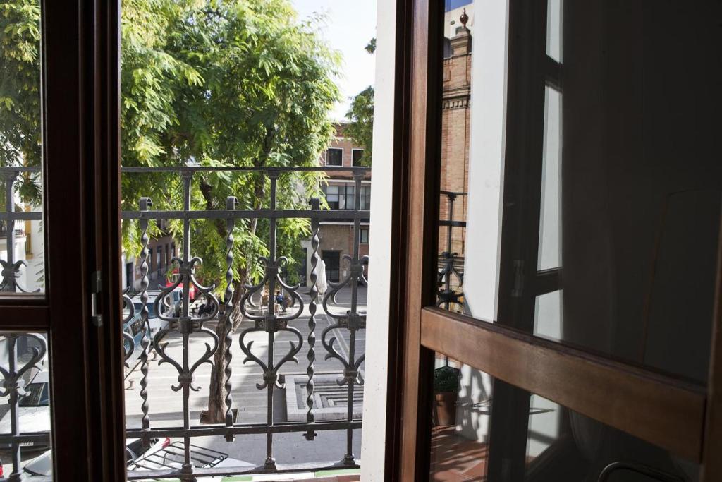 a view from a window of a balcony at Plaza de los Curtidores sevilla in Seville
