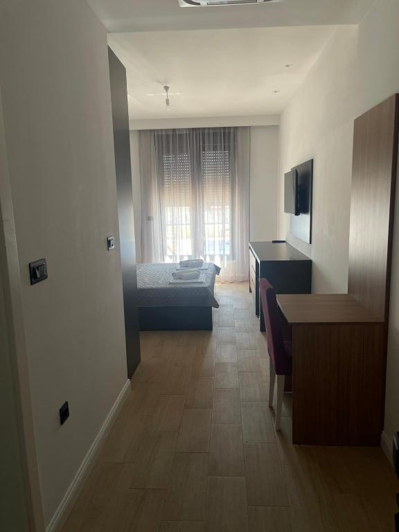 Postel nebo postele na pokoji v ubytování Elia Residence Rooms