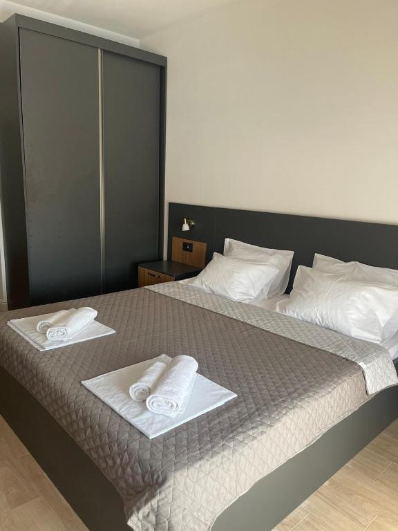 Postel nebo postele na pokoji v ubytování Elia Residence Rooms