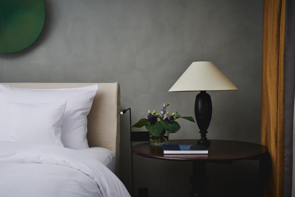 Postel nebo postele na pokoji v ubytování Hotel PURS