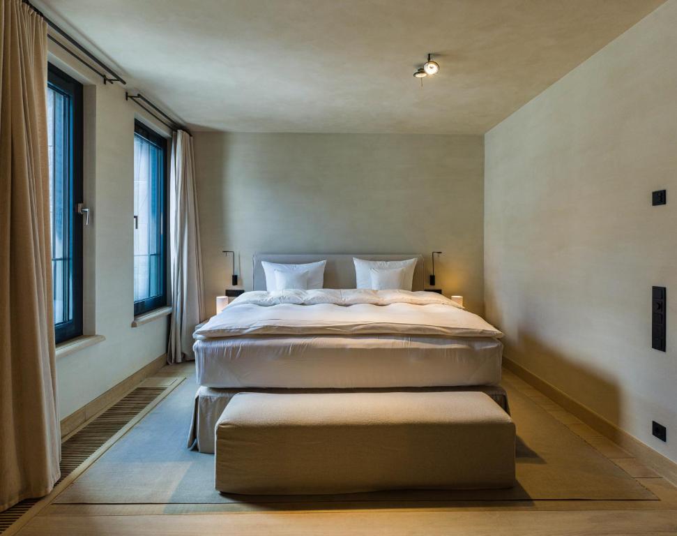 Postel nebo postele na pokoji v ubytování Hotel PURS