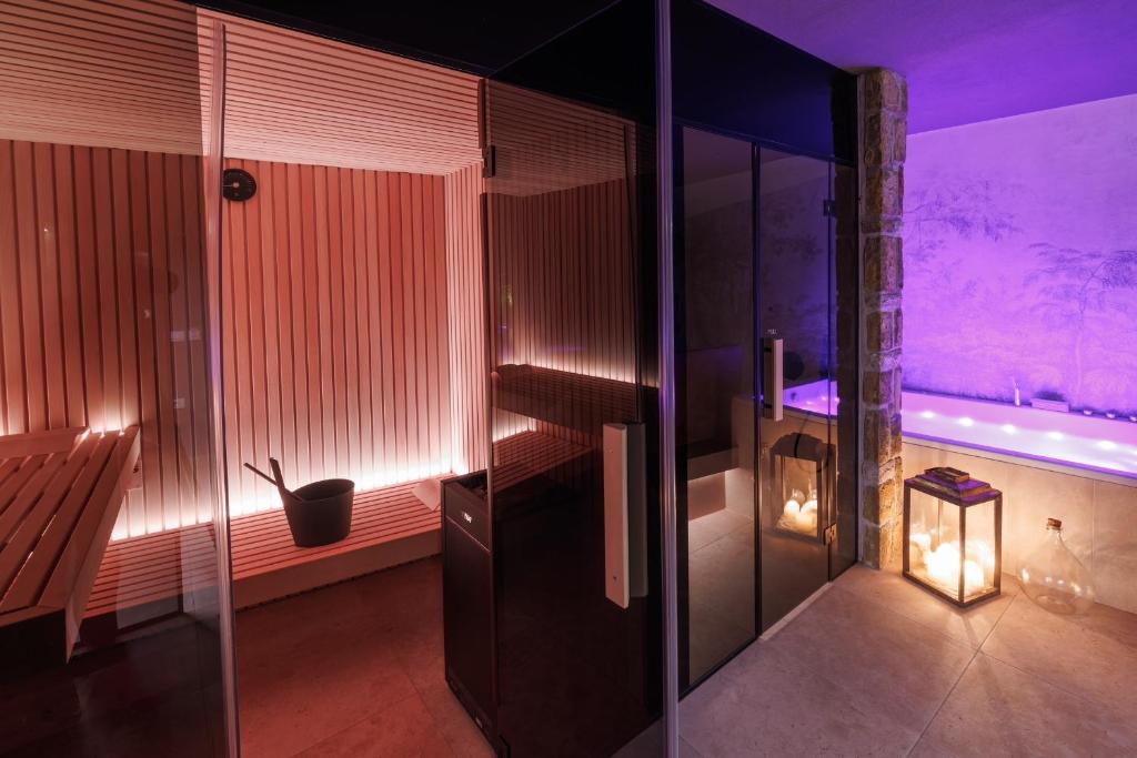 Postel nebo postele na pokoji v ubytování Vila ROBIDA & SPA
