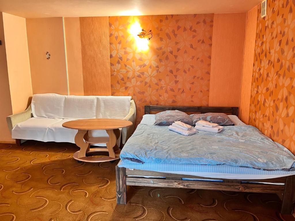 Postel nebo postele na pokoji v ubytování Mala Praha