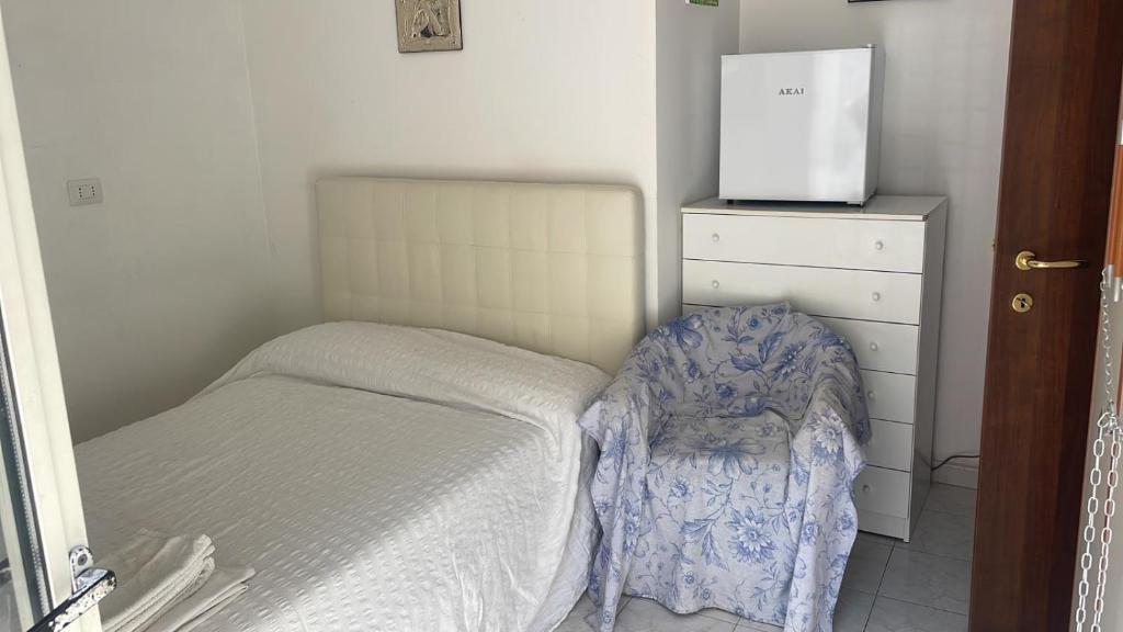 A bed or beds in a room at Annie's Home