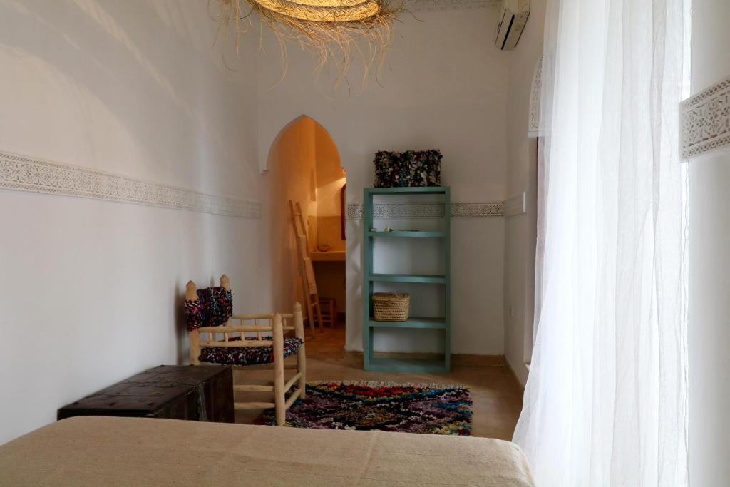 Postel nebo postele na pokoji v ubytování RIAD DAR DAR