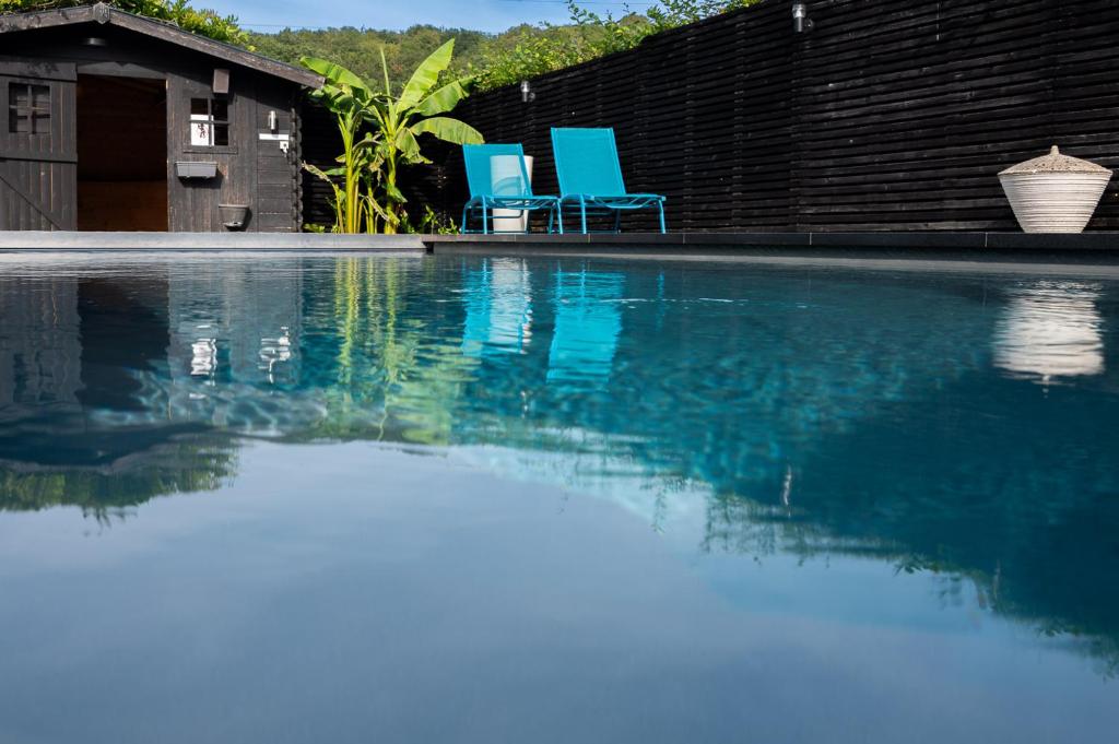 Bazén v ubytování Chez Sabine et Eric Maison pour 6 personnes avec piscine chauffée nebo v jeho okolí