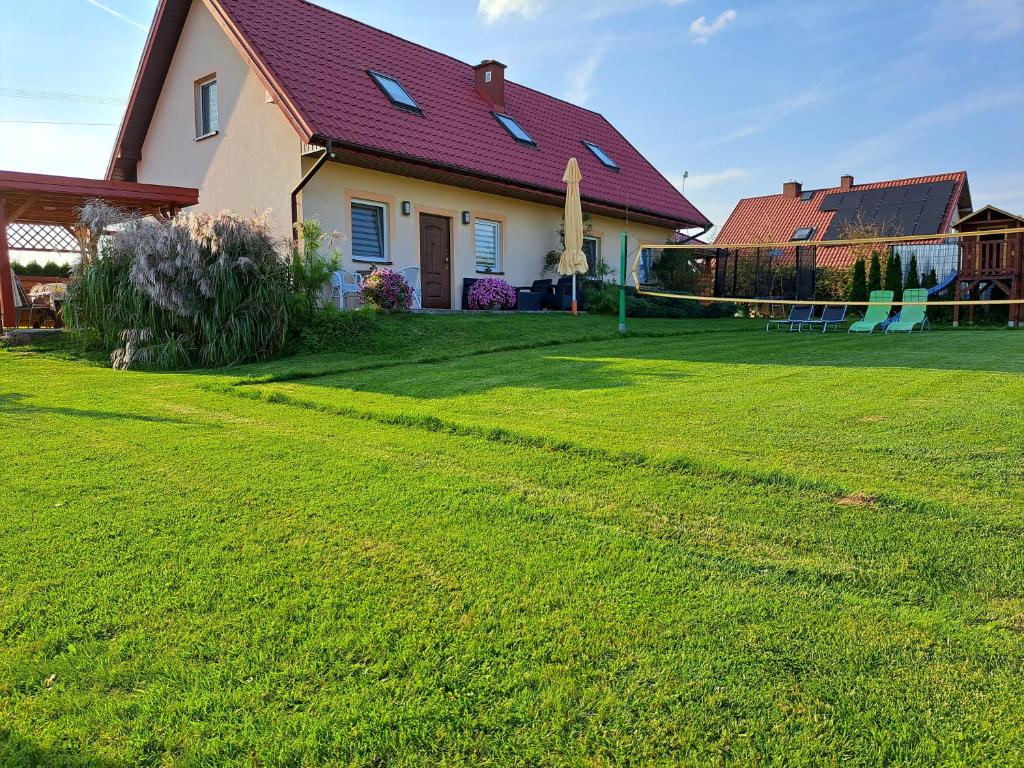 Vonkajšia záhrada v ubytovaní Gazdówka