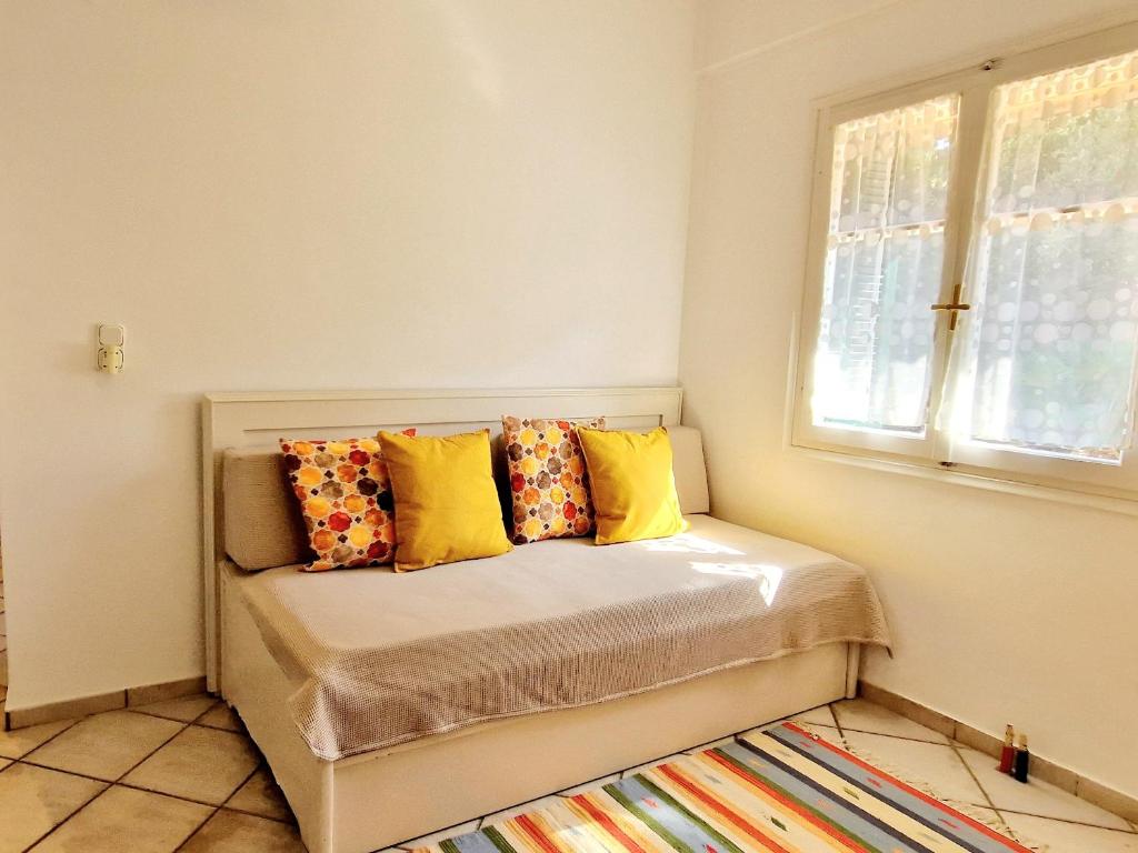 Posteľ alebo postele v izbe v ubytovaní Panorama Apartments Fiscardo