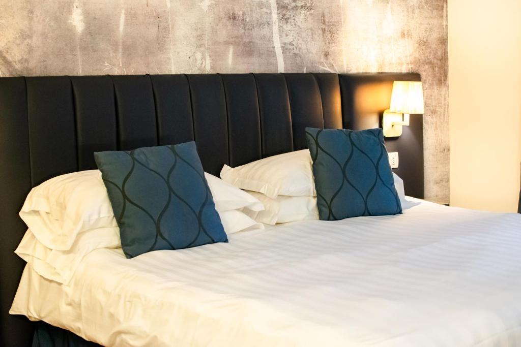 Postel nebo postele na pokoji v ubytování Hotel Du Lac & SPA