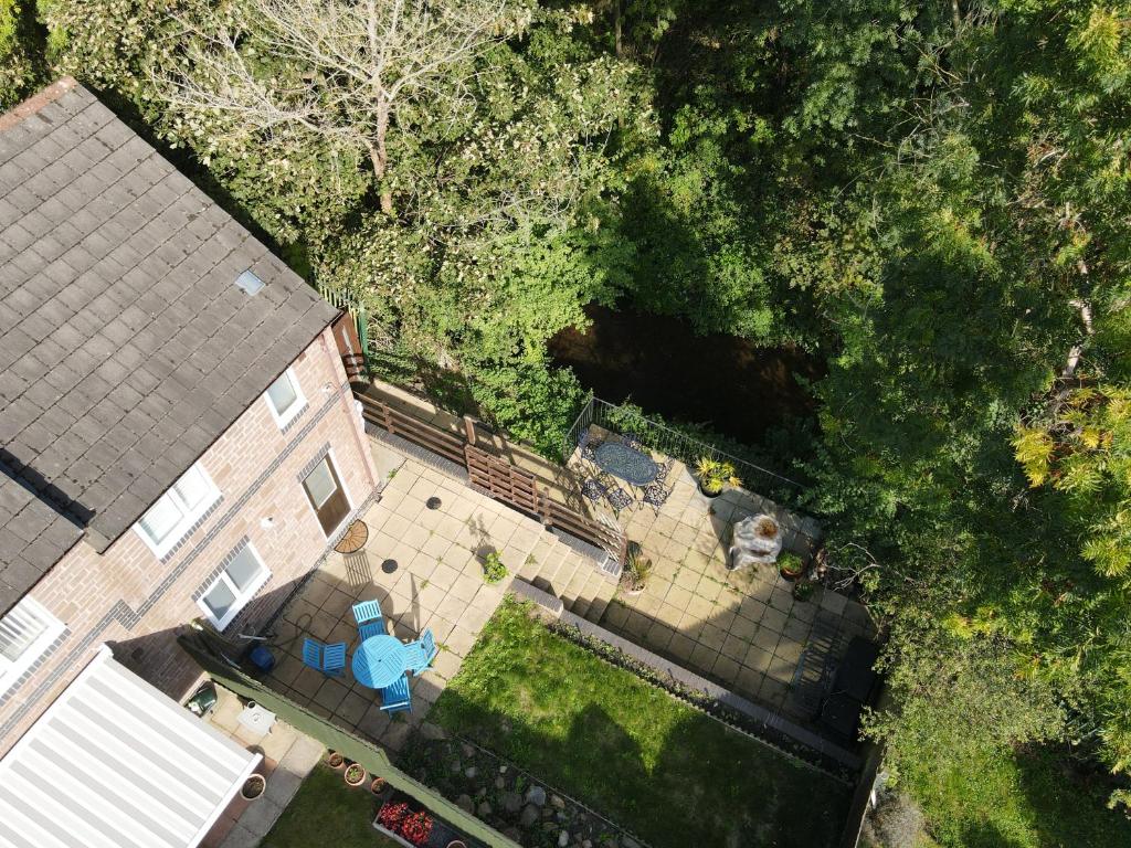an overhead view of a house with a patio at Riverside 2 Bedroom Townhouse with Car Charger in Abergavenny