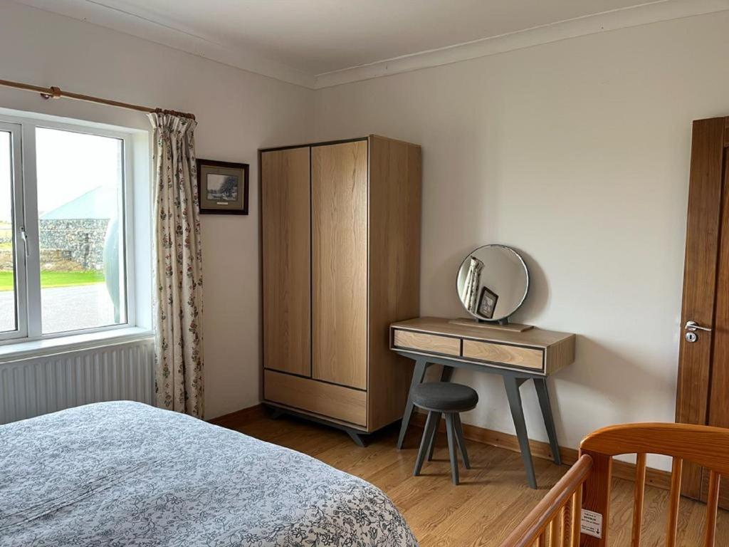 Postel nebo postele na pokoji v ubytování Foregloss Cottage