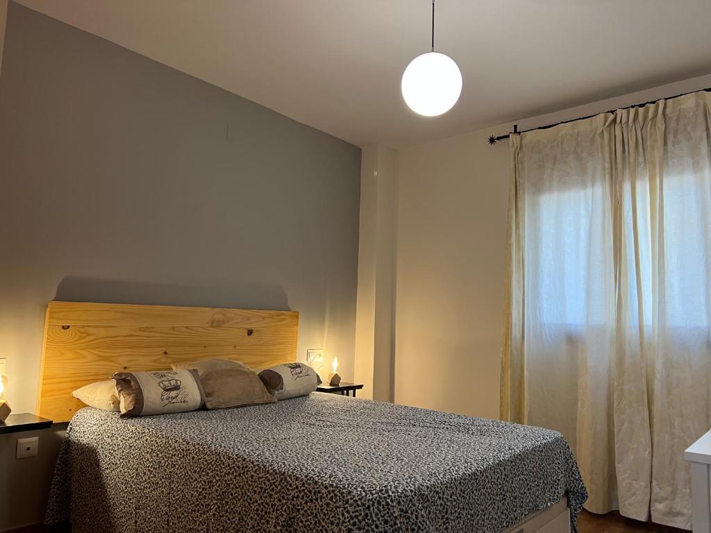 Postel nebo postele na pokoji v ubytování Urban Capuchinos
