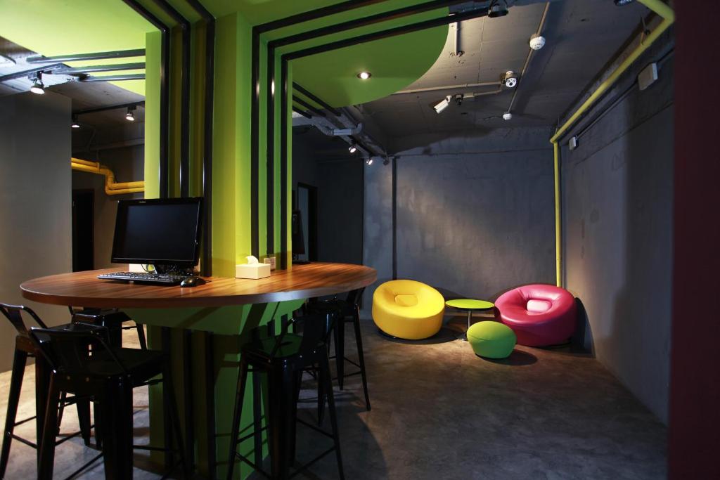 Posezení v ubytování Backpackers Hostel - Ximen