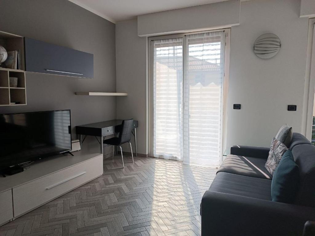 Televízia a/alebo spoločenská miestnosť v ubytovaní GF Holiday Suite