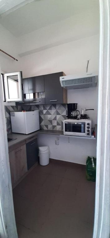 Kuchyň nebo kuchyňský kout v ubytování Leylandi rooms