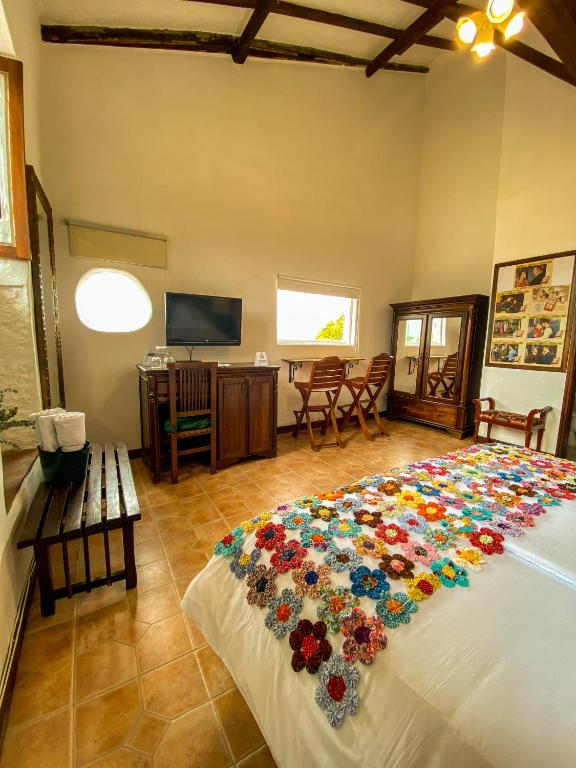 Postel nebo postele na pokoji v ubytování Hotel Mariscal Robledo