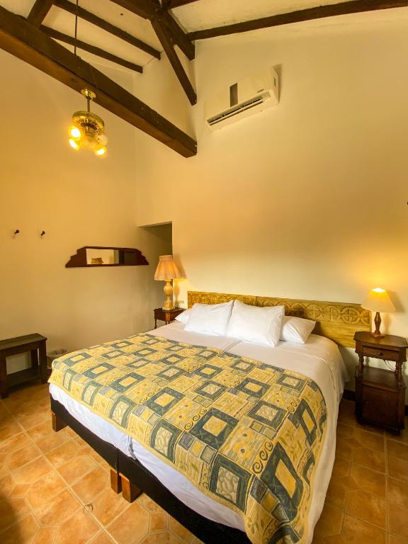 Postel nebo postele na pokoji v ubytování Hotel Mariscal Robledo