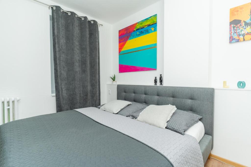 Posteľ alebo postele v izbe v ubytovaní Apartmány KRAKENS
