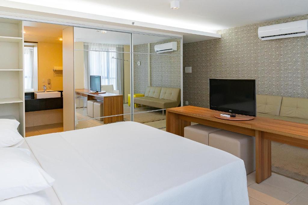 TV a/nebo společenská místnost v ubytování Meridiano Hotel