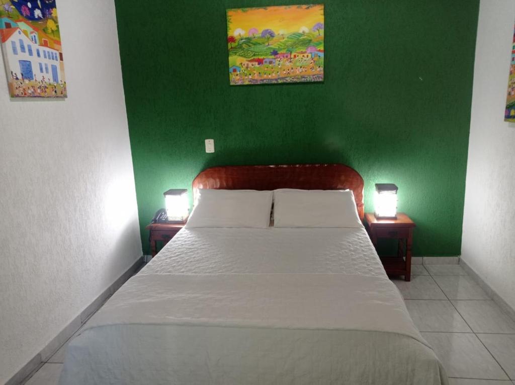 Cama o camas de una habitación en POUSADA CANA DO REINO