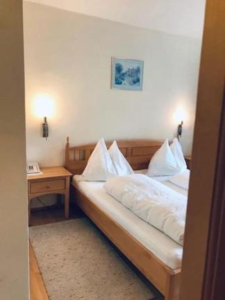 Postel nebo postele na pokoji v ubytování Hotel Daneu Gaschurn