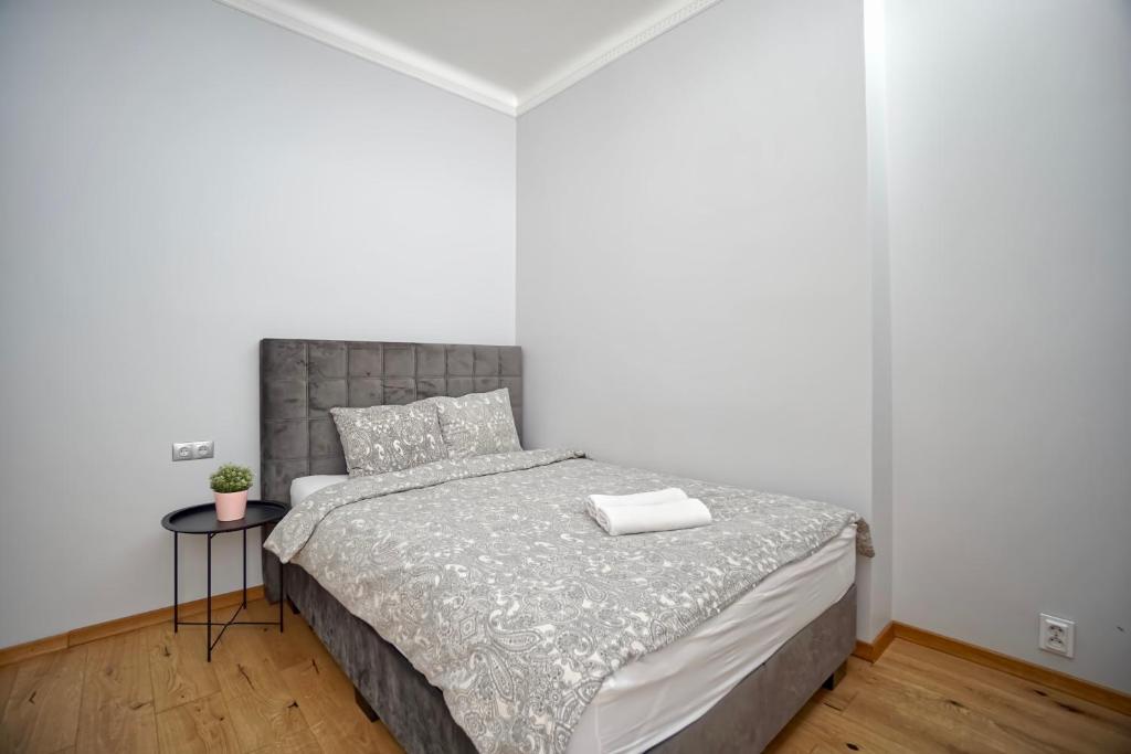 Posteľ alebo postele v izbe v ubytovaní Warsaw Premium Apartments Deluxe Old Town