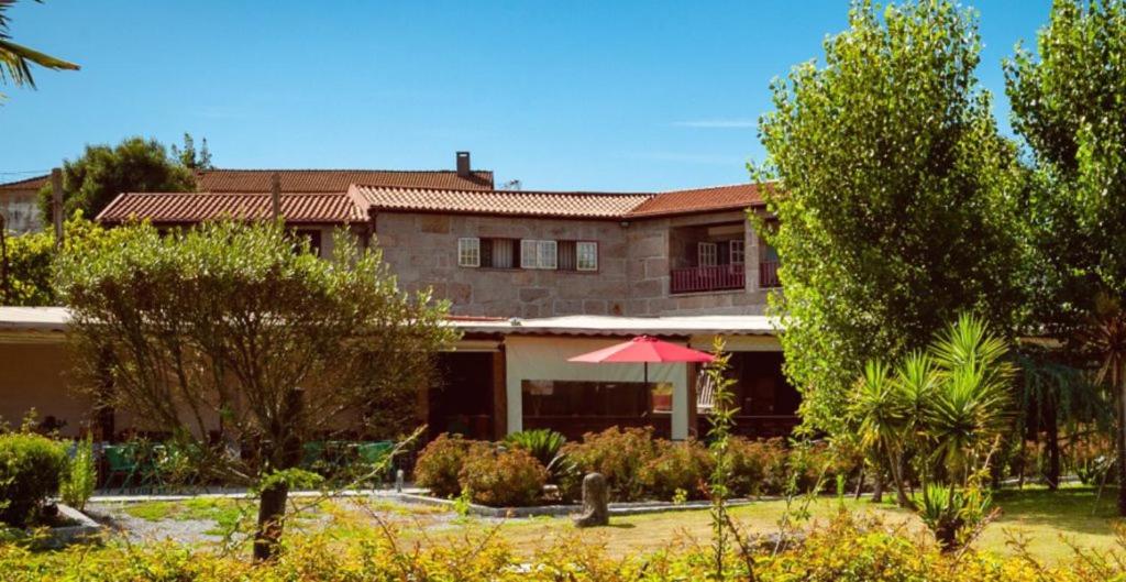 Κήπος έξω από το DM TURISMO RURAL povoa de lanhoso