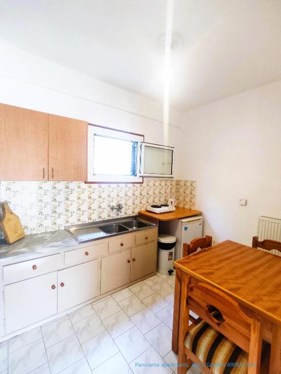 Kuchyň nebo kuchyňský kout v ubytování Panorama apartments