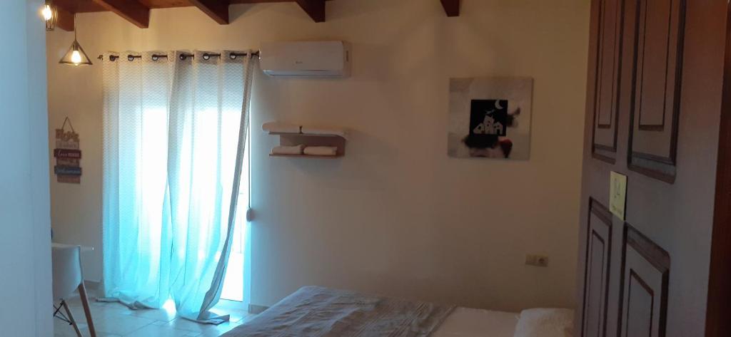 A bed or beds in a room at Patra Studio B4