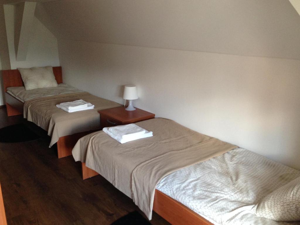 Rúm í herbergi á B&B Rot