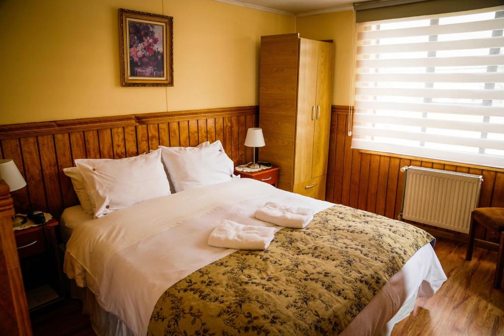 Postel nebo postele na pokoji v ubytování Hostal Hielo Sur