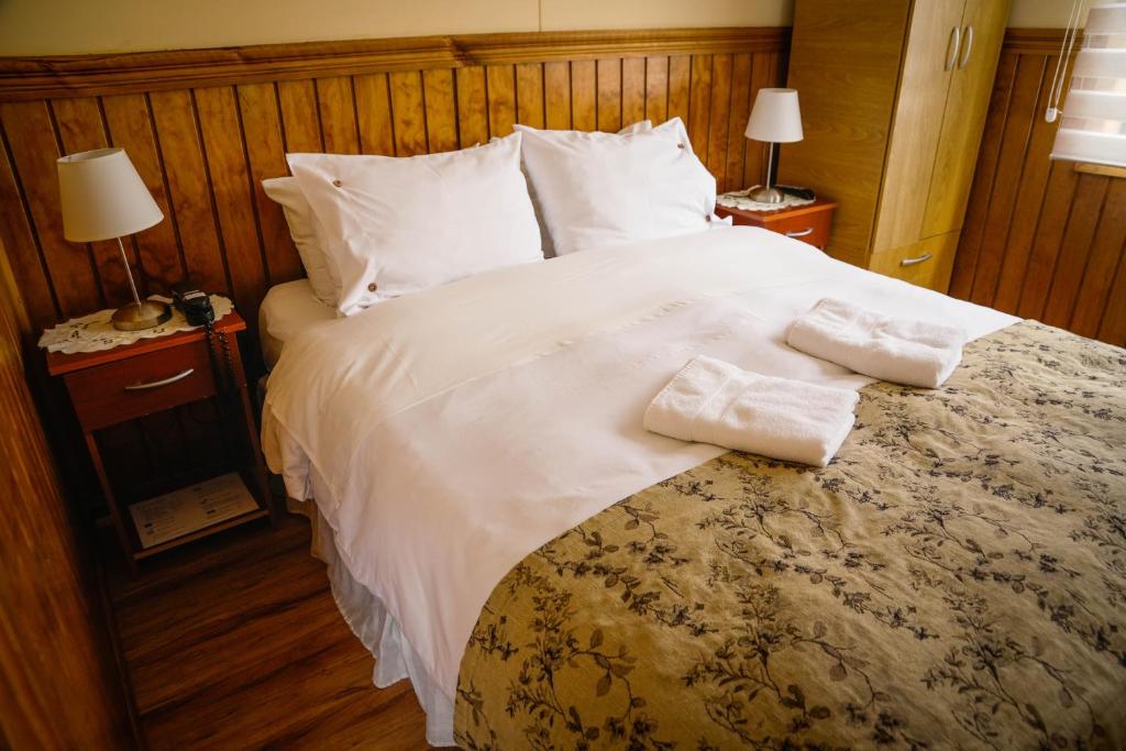Postel nebo postele na pokoji v ubytování Hostal Hielo Sur