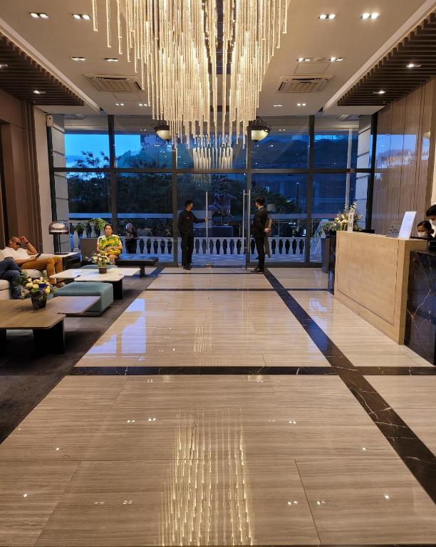 Posezení v ubytování Uptown Parksuites Tower 1 at BGC - Staycations Up Above 12