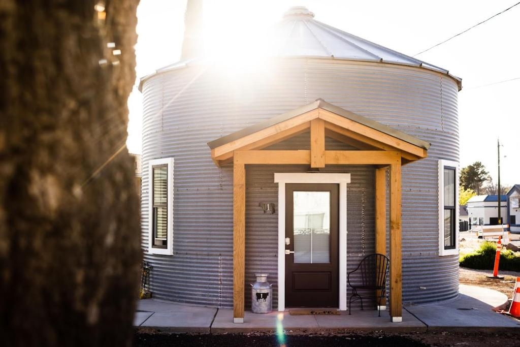 a small church with a door and a porch at Silo Suite 1 Pet Friendly- Near Zion National Park in La Verkin