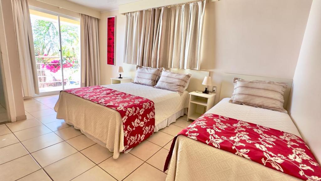 Postel nebo postele na pokoji v ubytování Hotel Maea Hare Repa