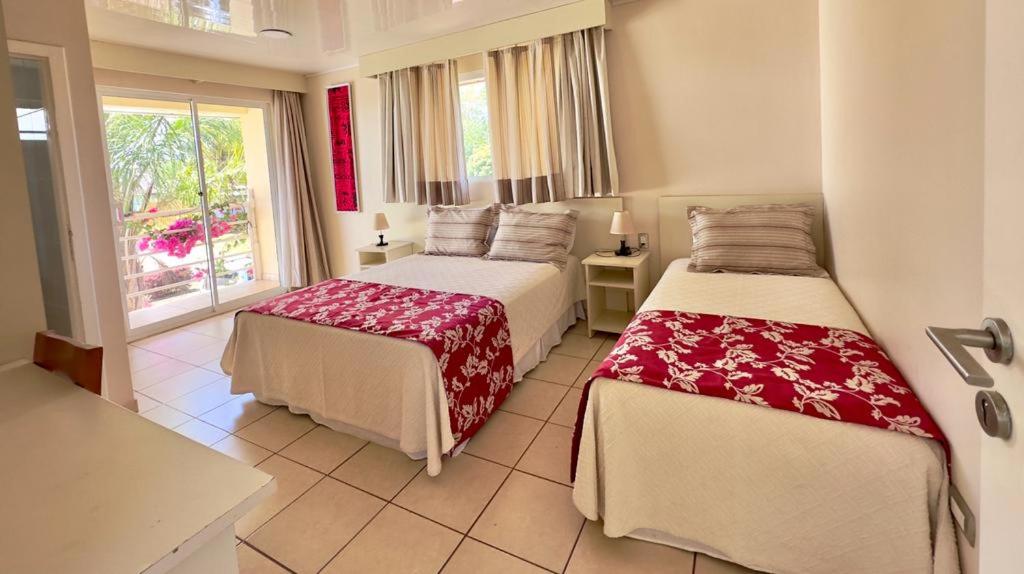 Postel nebo postele na pokoji v ubytování Hotel Maea Hare Repa