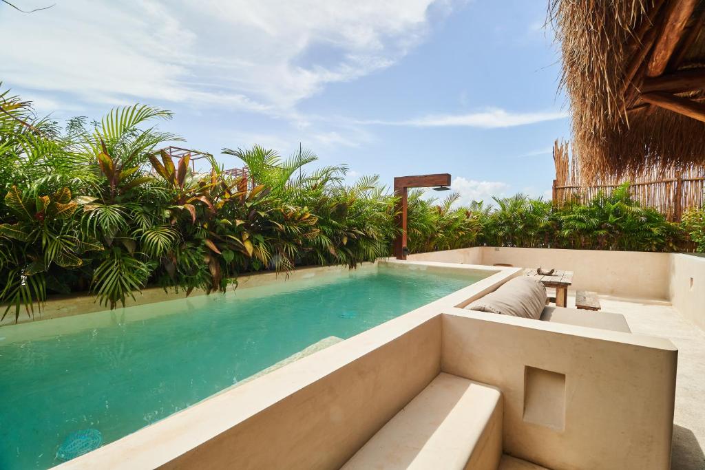 Exquisite Apartment in Aldea Zama with Private Rooftop Pool and Two