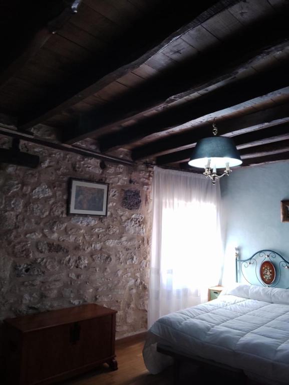 Cama o camas de una habitación en La casa de Aza
