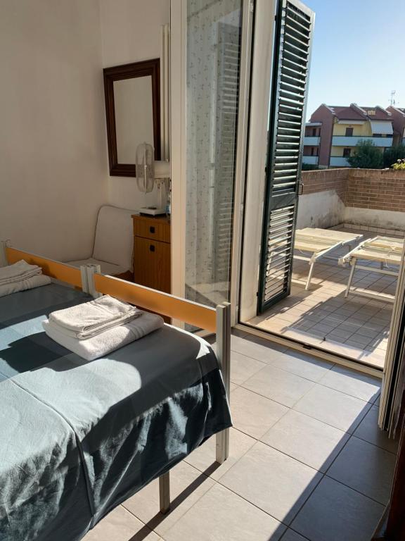 Postel nebo postele na pokoji v ubytování B&B La Salina