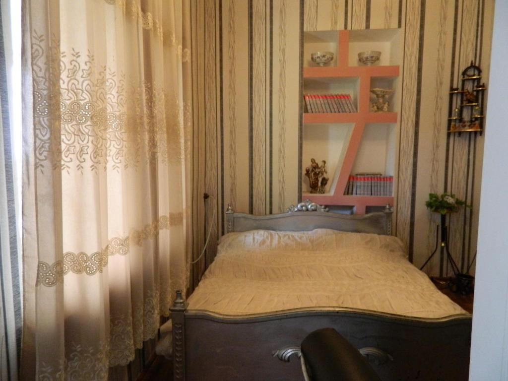 Postel nebo postele na pokoji v ubytování Guest house Gidi