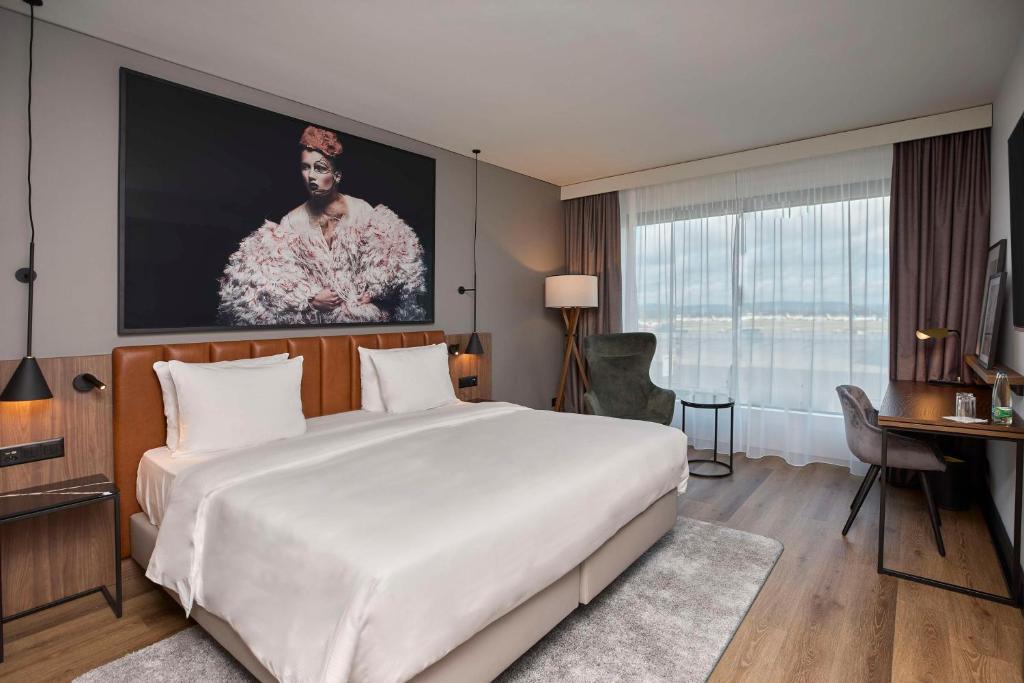 Letto o letti in una camera di Radisson Blu Hotel Zurich Airport